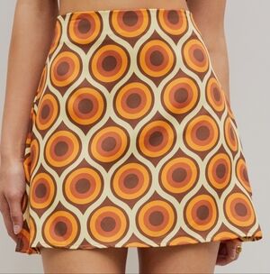 Cider Vibrant Circle Mini Skirt in Orange and Brown